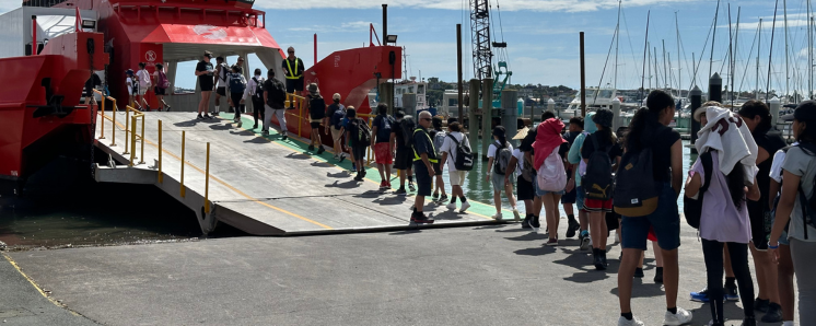 School group boarding SeaLink ferry at Half Moon Bay